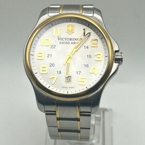 Victorinox Swiss Army Men’s Swiss made Officer’s Silver and Gold Watch Working